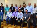 Members of the HF/VHF Committees. Standing (L-R): Cesar Brousek, OA4CLU; Carlos Rodriguez, CX7CO; Shizuo Endo, JE1MUI; Don Beattie, G3BJ; Christian Buenger, DL6KAC; Ronald Tsoi-a-Fatt, 9Y4RX; Ole Garpestad, LA2RR; Jonathan Siverling, WB3ERA, and Gopal Madhavan, VU2GMN. Seated (L-R): Paulo Hernandes, PT2NP; Flavio Archangelo, PY2ZX; Brian Mileshosky, N5ZGT, and Glenn MacDonell, VE3XRA.